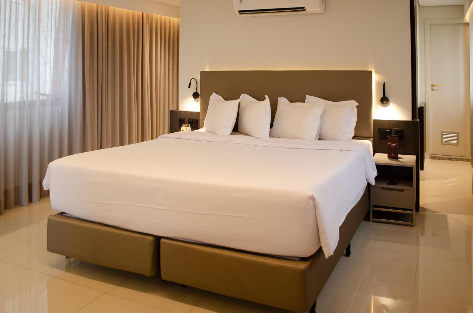 Royal Boutique Savassi Hotel Belo Horizonte Eksteriør bilde A king bed