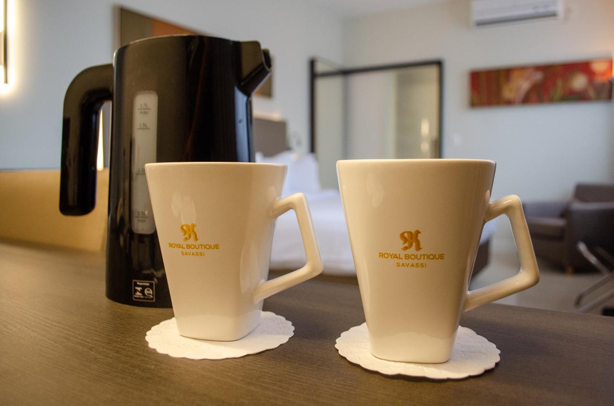 Royal Boutique Savassi Hotel Belo Horizonte Eksteriør bilde A kettle and two cups